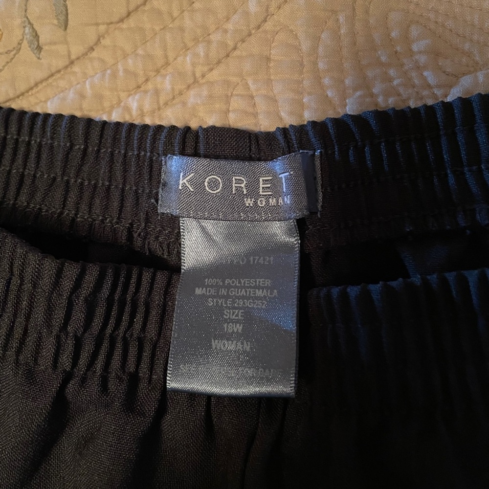 18W Koret dark grey slacks.